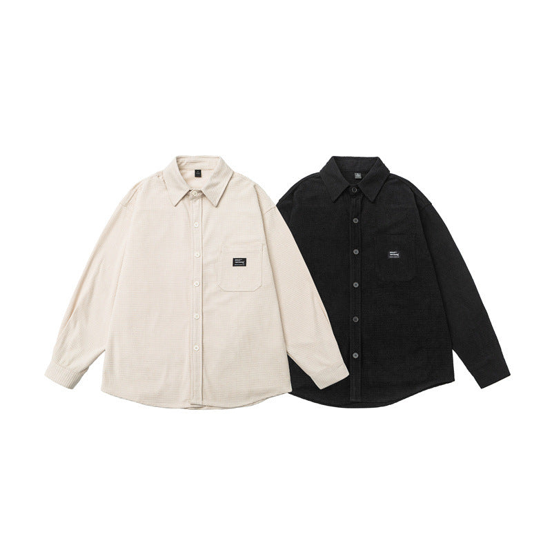 Washed and worn solid color long sleeved men's workwear shirt