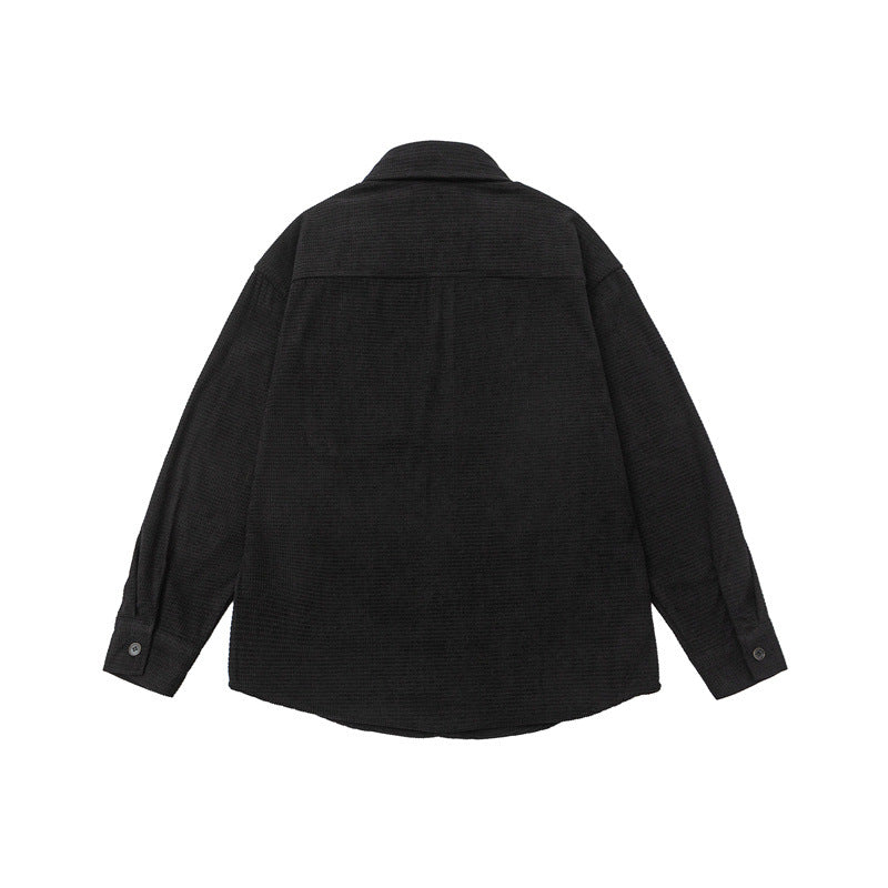 Washed and worn solid color long sleeved men's workwear shirt