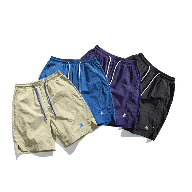 Embroidered quick drying couple cropped shorts for men